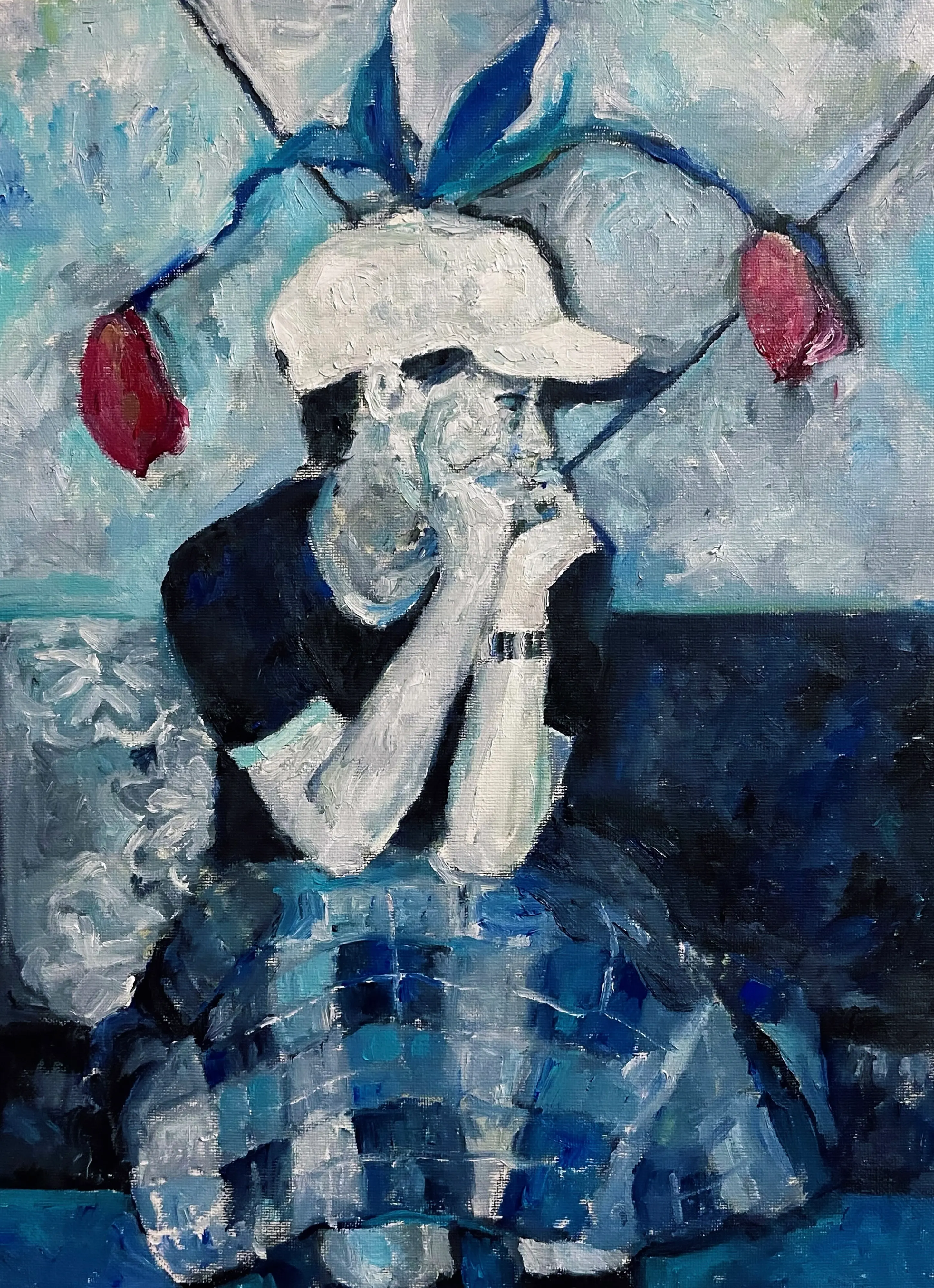 青色の油絵具で、自画像が描かれている絵画